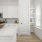 pantry and shelving next to kitchen windows