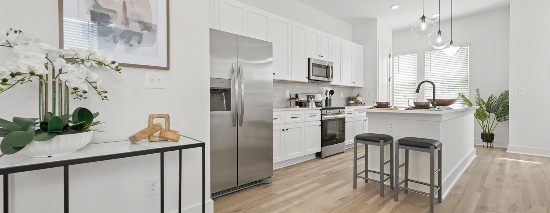 open concept kitchen with ample lighting