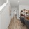 staircase adjacent to home office space